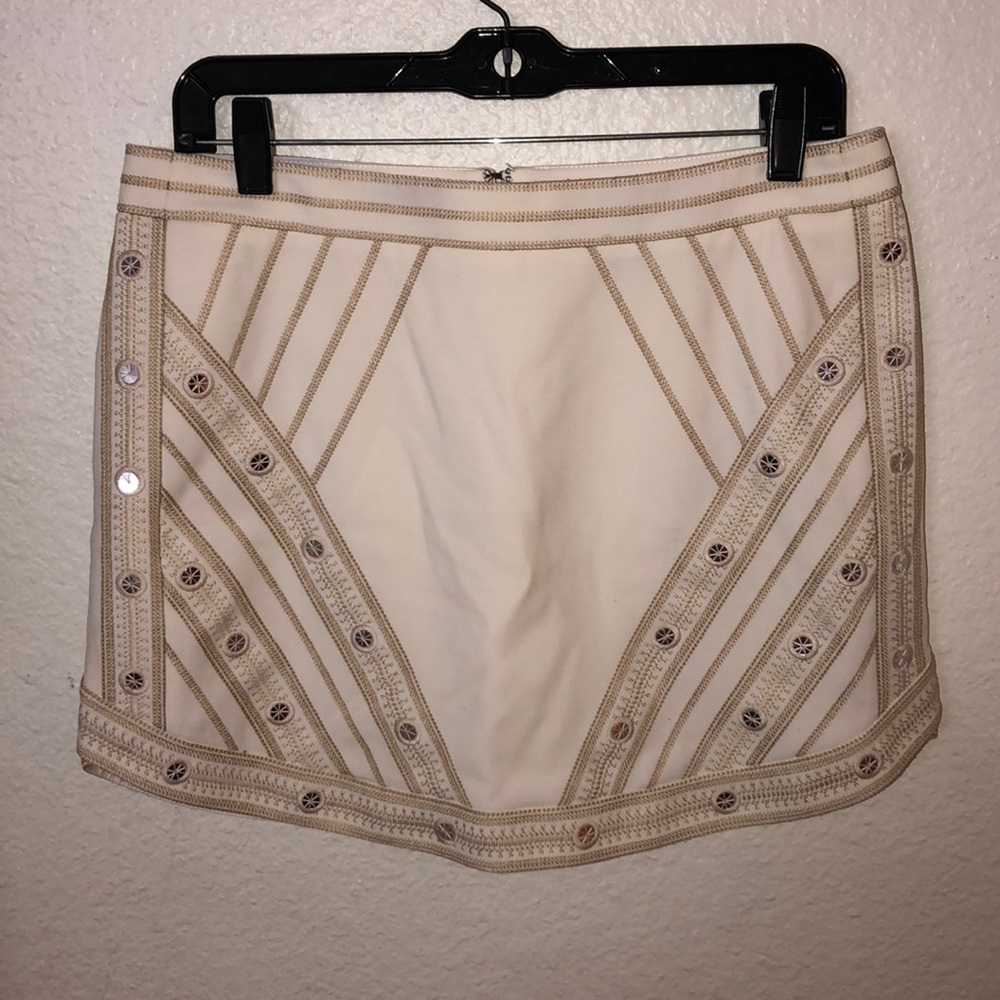 WHITE SKIRT WITH GOLD AND SLIVER DETAILING
